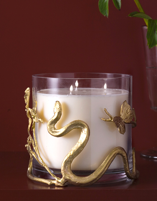 New York's Maison Gerard offers Claude's hand-chased bronze candleholder and honeysuckle candle