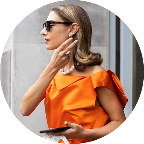 Artist and stylist Jenny Walton in orange dress Jenny Walton 1stDibs Review