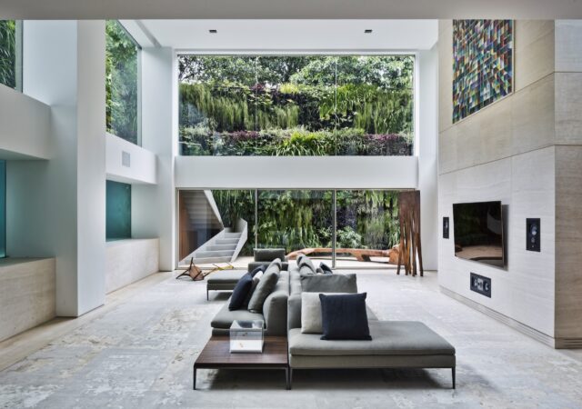 featured image for post: This Refined São Paulo Duplex Has a Swimming Pool in the Living Room Wall