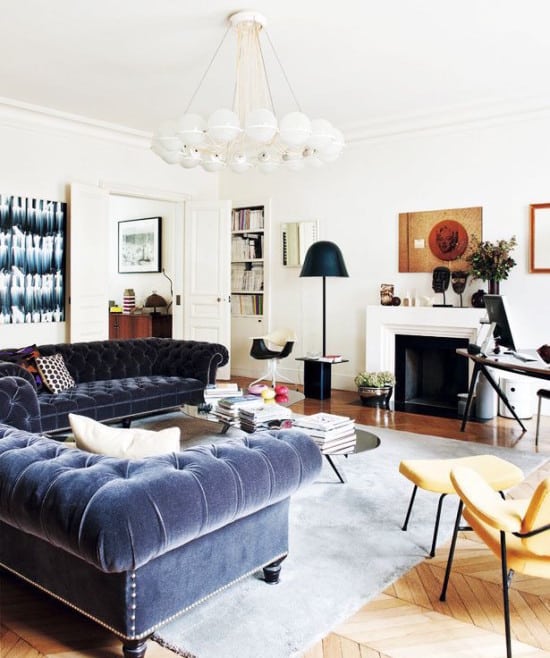 Velvet Chesterfield Sofas Trend Spotlight Designer Sandra Benhamou S Contemporary Paris Apartment Contains Not One But Two Lush Blue Velvet Chesterfield Sofas The White Chandelier Overhead Is By
