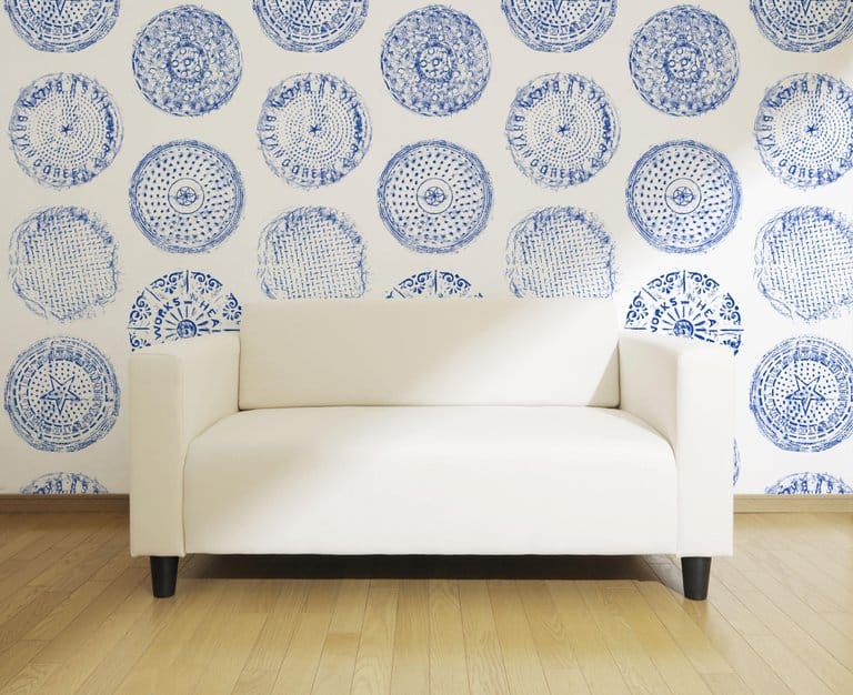 Brooklyn Manhole wallpaper in blue by Merenda Wallpaper