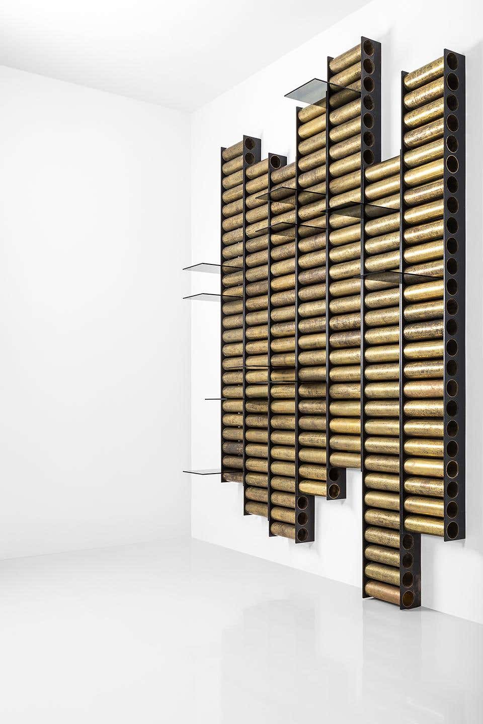 This Shelving System with Oxidized Brass Tubes Is Retro and Futuristic at Once