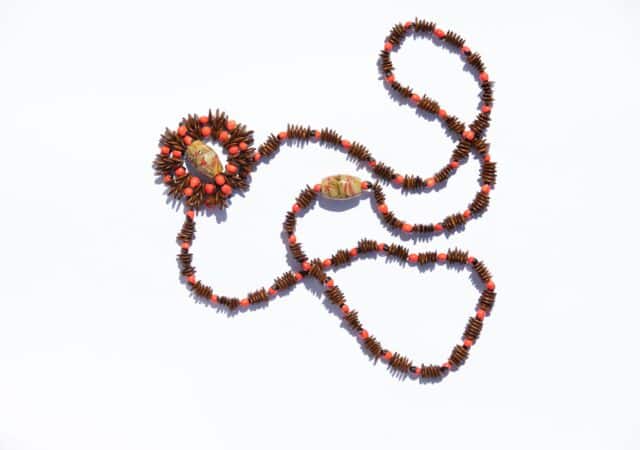 featured image for post: Style Meets Sustainability in This Necklace Crafted by Women Preserving an Afro-Caribbean Art Form