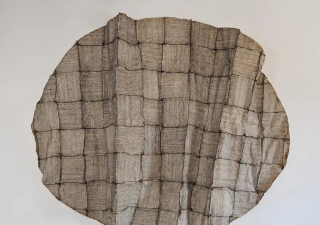 featured image for post: Hideho Tanaka Carefully Stitched Together Pieces of Paper to Make This Sculptural Textile