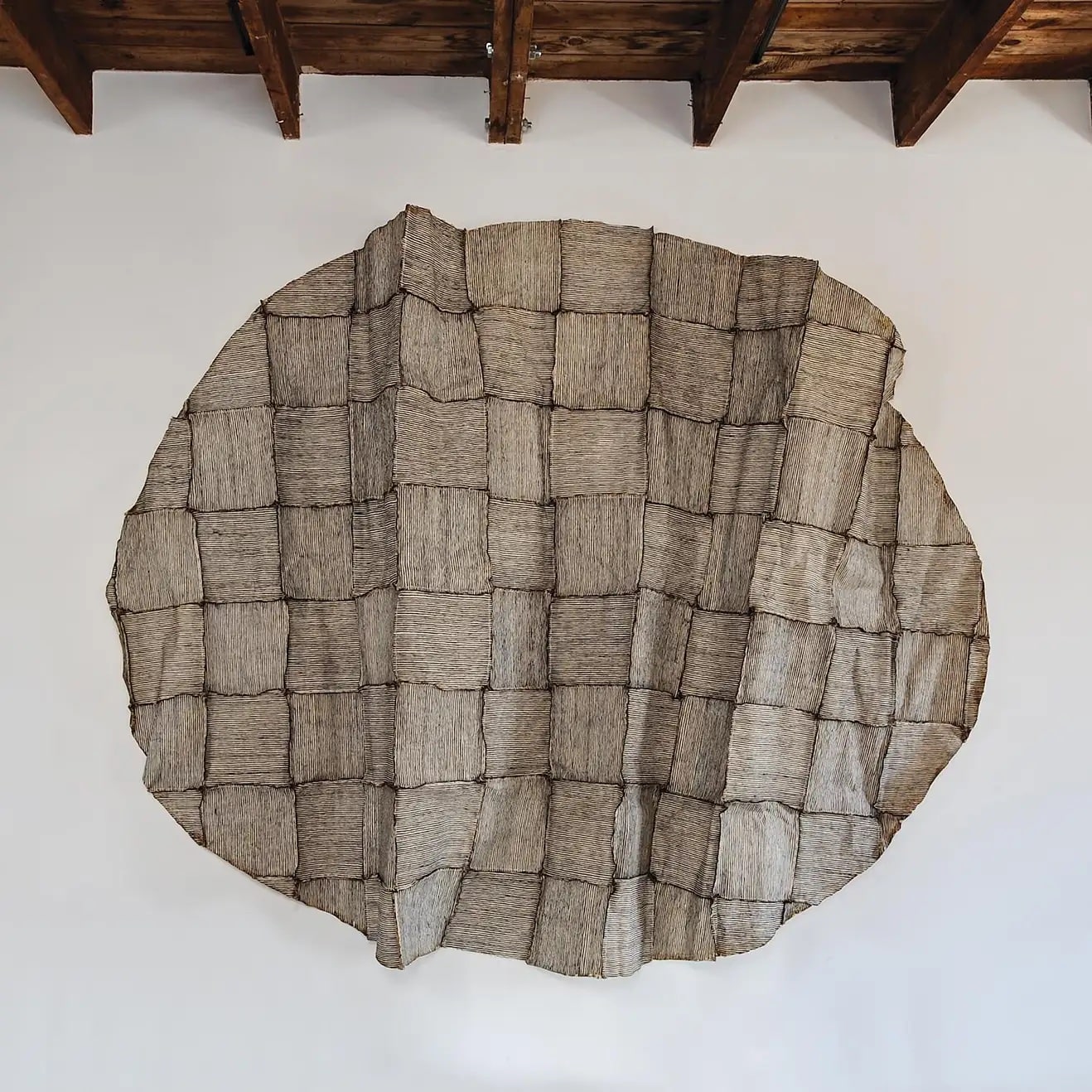 Hideho Tanaka Carefully Stitched Together Pieces of Paper to Make This Sculptural Textile