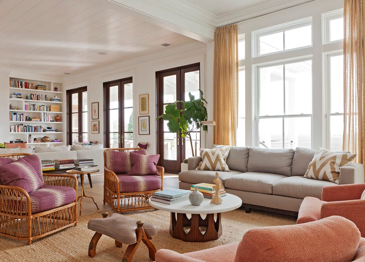How To Bring Rattan Into Your Spaces In An Elevated Way The Study A Freshly Hued Ikat Textile Brightens Up Set Of Rattan Armchairs In This Charleston South Ina Living Room By Hranowsky Photo Julia Lynn