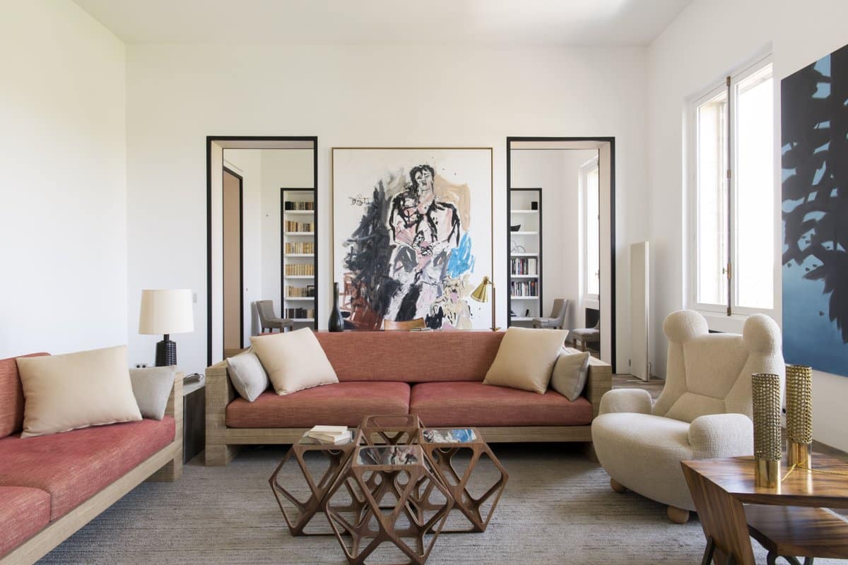 23 Ways To Rethink The Classic Wingback Chair Study Pierre Yovanovitch Outfitted This Paris Living Room With A Wingback Of His Own Design The Hans Wegner Inspired Bear Chair Photo By Stephan Julliard