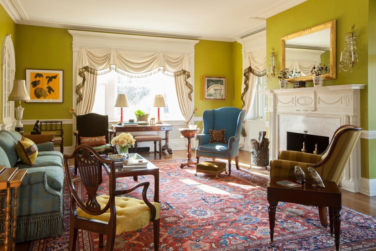 Brockschmidt and Coleman used white paint to freshen up the fireplace and moulding of this Federal Revival house in Wilmington, Delaware.