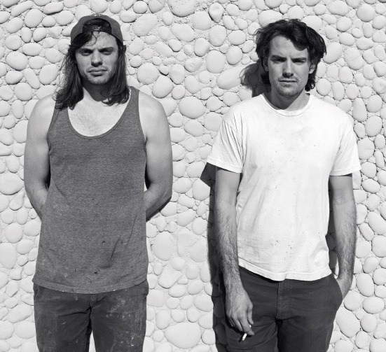 Nikolai Haas and Simon Haas pose in black and white