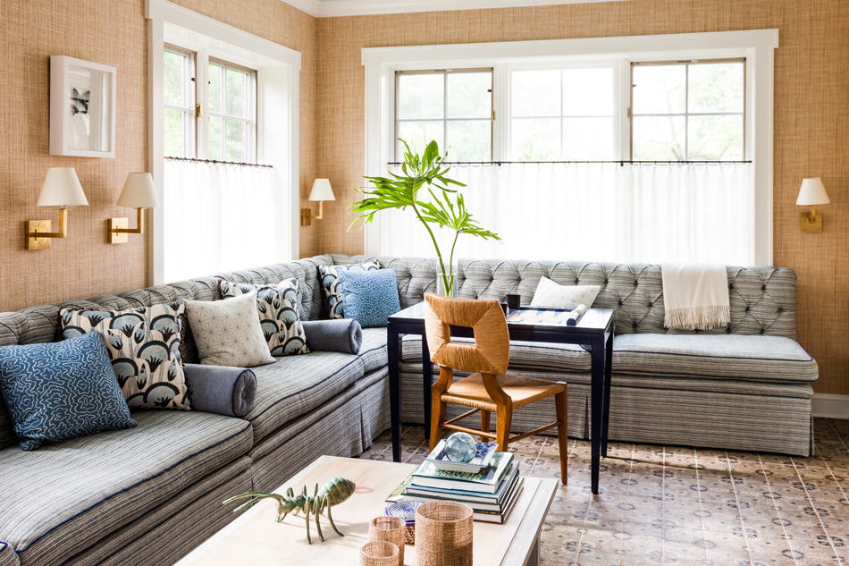 A small, rarely used room in the Rye house became a popular gathering place once Gilbane installed a custom 25-foot-long sectional and several game tables.