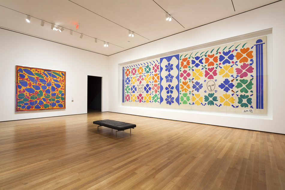 The works dazzle with their colors, shapes and, in the case of Large Decoration with Masks, 1953, at right, their enormous scale. Photo by Jonathan Muzikar © 2014/MoMA