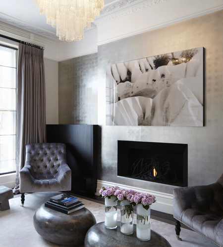 Barratt-Campbell signatures include luxurious textures and statement lighting pieces, both in evidence at her home, which features silk-velvet chairs and stools upholstered in embossed suede.
