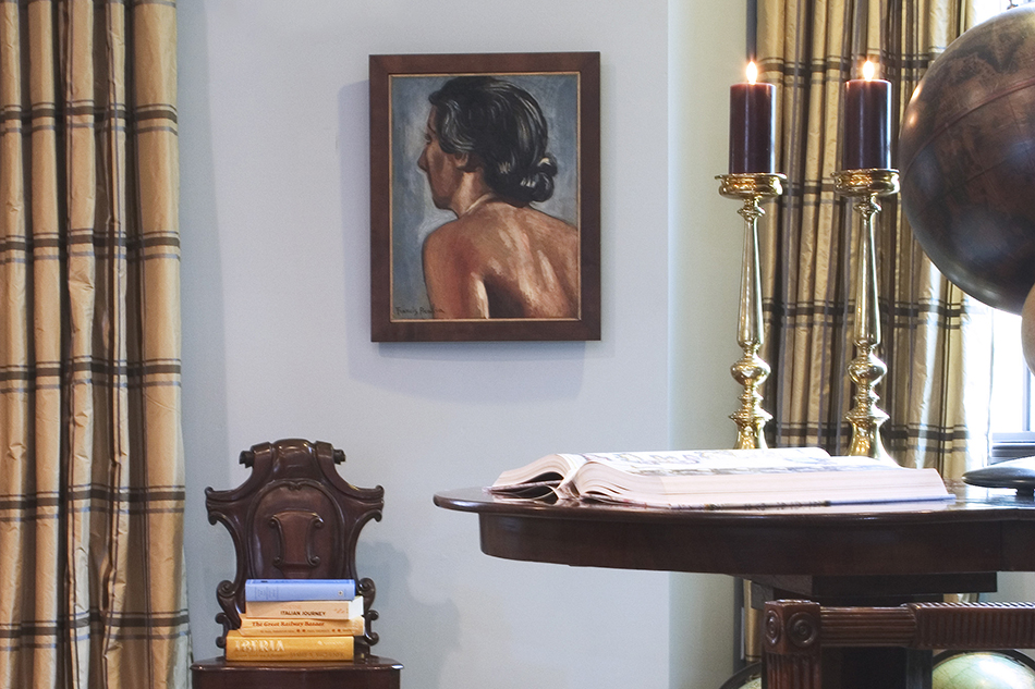 For the 2006 New Jersey Showhouse, the designer opted for a more subdued palette, placing an antique English hall chair from John Rosselli Antiques and a painting by Francis Picabia on a pale blue background. Photo by Patrik Rytikangas