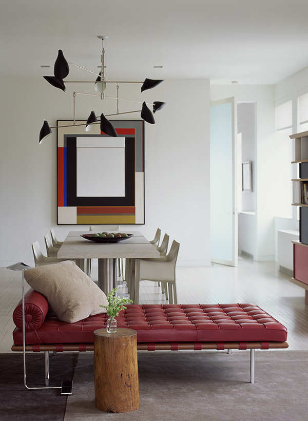 In the living area of a Chelsea apartment, Bierman combined mid-century modern and contemporary pieces, with a Mies van der Rohe chaise, chairs from Cassina and a multi-armed chandelier by David Weeks for Ralph Pucci. Photo by Peter Margonelli
