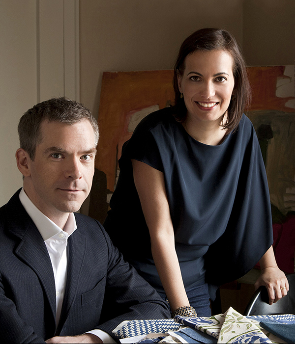 Jesse Carrier and Mara Miller, the husband-and-wife principals of the interior design firm Carrier and Company. Photo by Don Freeman; Top: An IKEA bookshelf brightens a den in the Wilton, Connecticut, home of Yvonne and Jay Fielden. Photo by Ben Hoffmann.