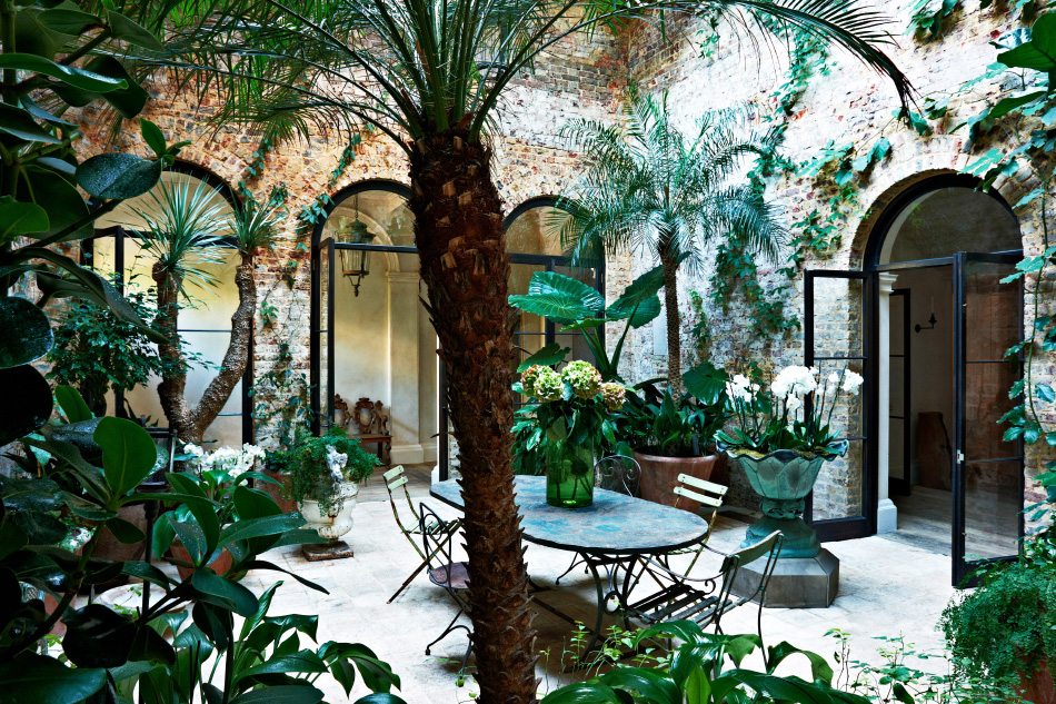 The designer’s London home opens onto several internal garden spaces.