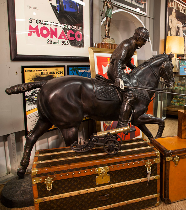 At Pullman Studios, a polo player in bronze stands beside vintage Louis Vuitton trunks, which is a particular speciality of Khachadourian’s.