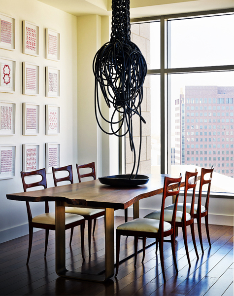 A light by Kwong Ho Lee, from JF Chen, echoes drawings by Louise Bourgeois. The table is by Stefan Lawrence and is from Twentieth and the Arturo Pani chairs from Adesso. Photo by Jonn Coolidge