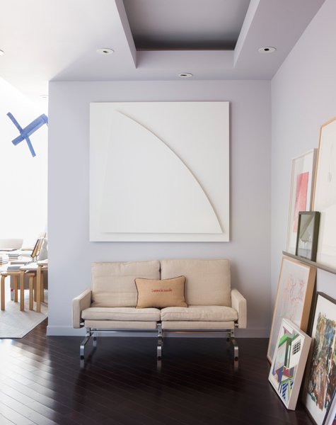 Says Furth: “An ever-changing collage of art sets the tone for this contemporary Hollywood home,” where an Ellsworth Kelly painting hangs above a sofa by Poul Kjærholm. Photo by Stephen Busken