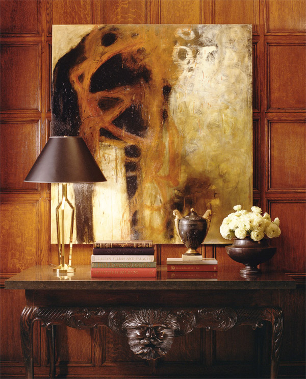 A view of a Kips Bay bedroom. The brass lamp, designed by Smyth, sits on an 18th-century Irish console from Kentshire. The oil painting is by Melinda Stickney-Gibson.