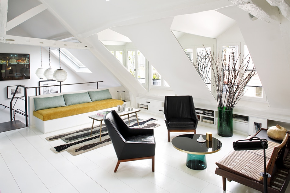Lavoine added darker materials and accents to the white painted light filled aerie mixing vintage furnishings with a contemporary classicon bell Lavoine added darker materials and accents to the white painted light filled aerie mixing vintage furnishings with a contemporary classicon bell