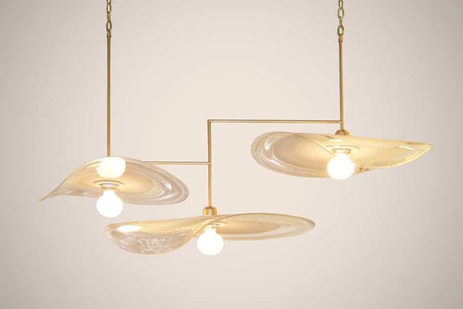 How One Work Became The East Coast Epicenter Of Glass Art Harris S Lilypad Chandelier Features A Trio Of Blown Glass Lilypads Connected By Steel Rods All Photos Courtesy Jamie Studio