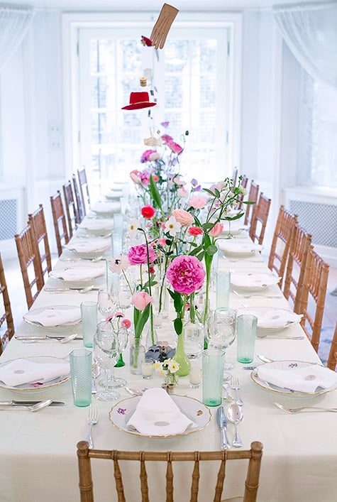 dining table with floral centerpiece