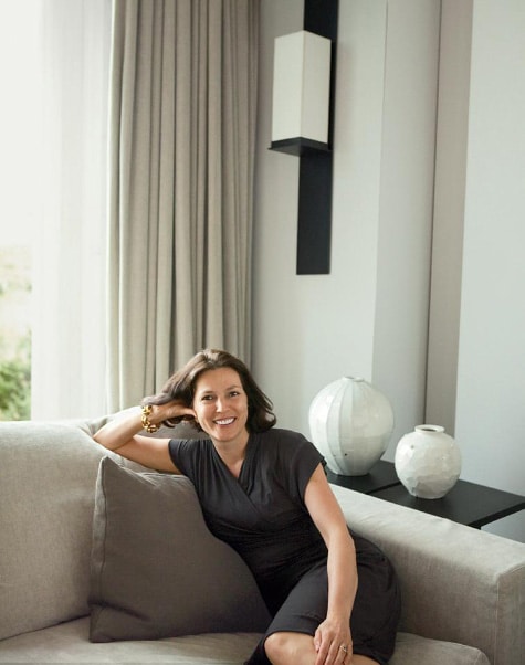 woman sitting on sofa