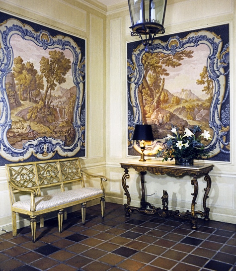 entryway with murals