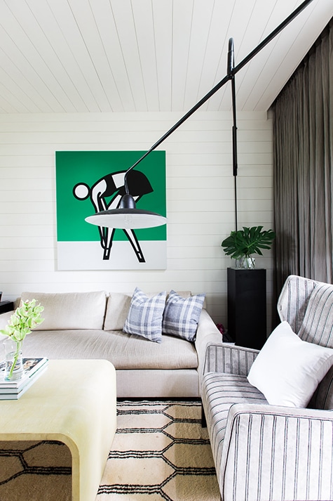white living room with Julian Opie artwork