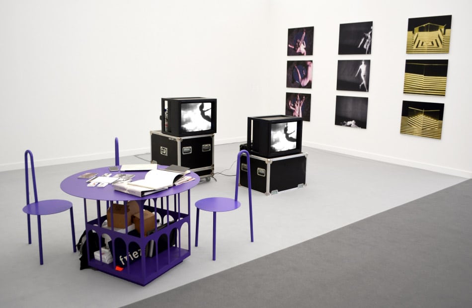A purple table-and-chair set by Harry Nuriev makes an eye-popping combination with black-and-white works by Hans Breder in the Ethan Cohen Gallery booth at Frieze New York, 2018