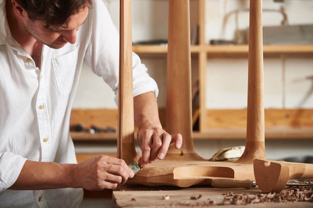 Kurtz working on his cherrywood Pavilion stool