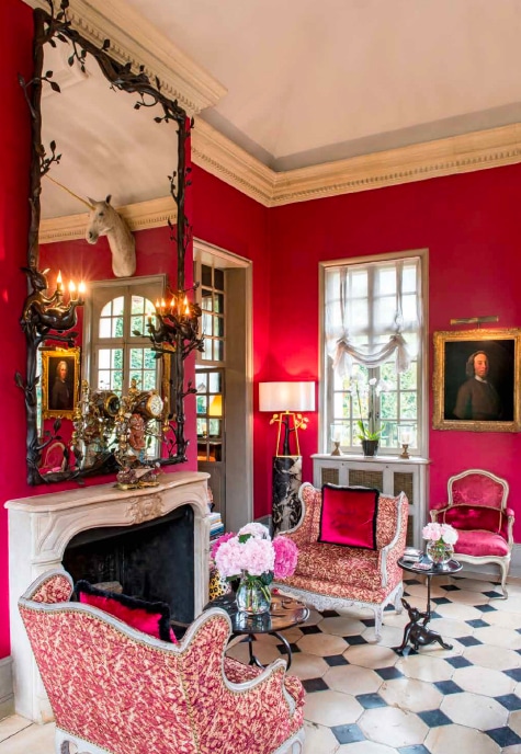 Hubert Le Gall's mirror hangs over the fireplace at Saint-Calais