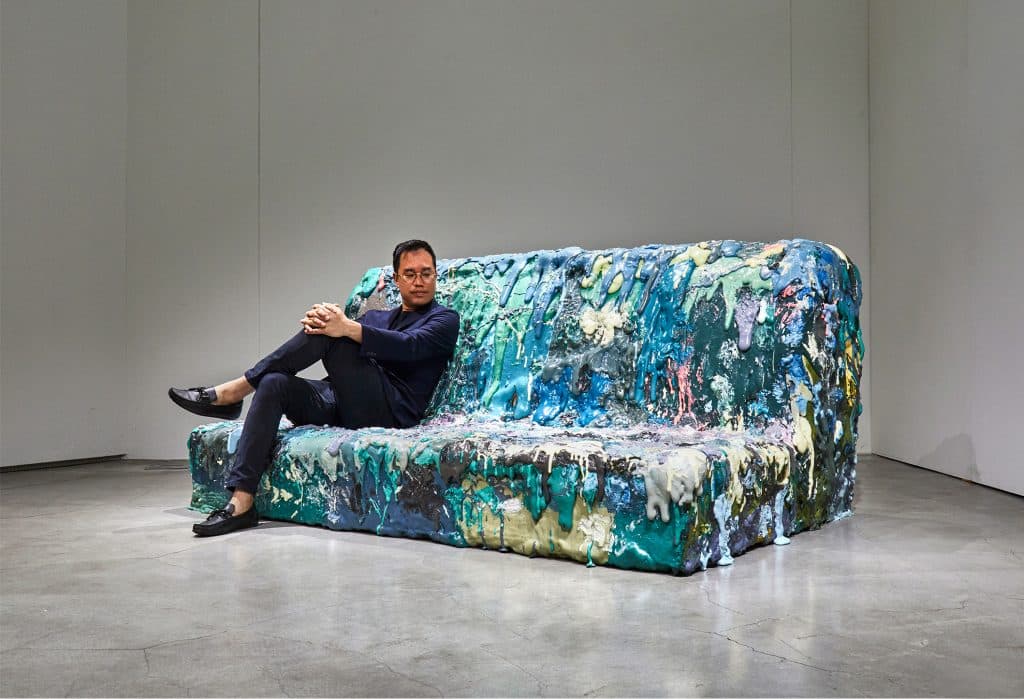Sang Hoon Kim on his four-person sofa