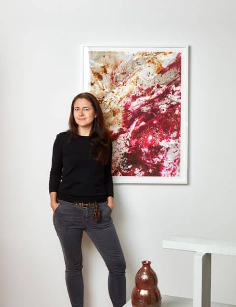 Alexandra Rowley stands in front of Untitled from her Process series