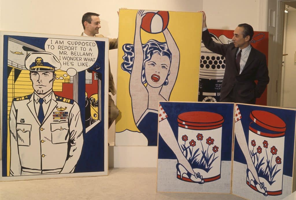 Roy Lichtenstein with his Paintings in a Gallery Space