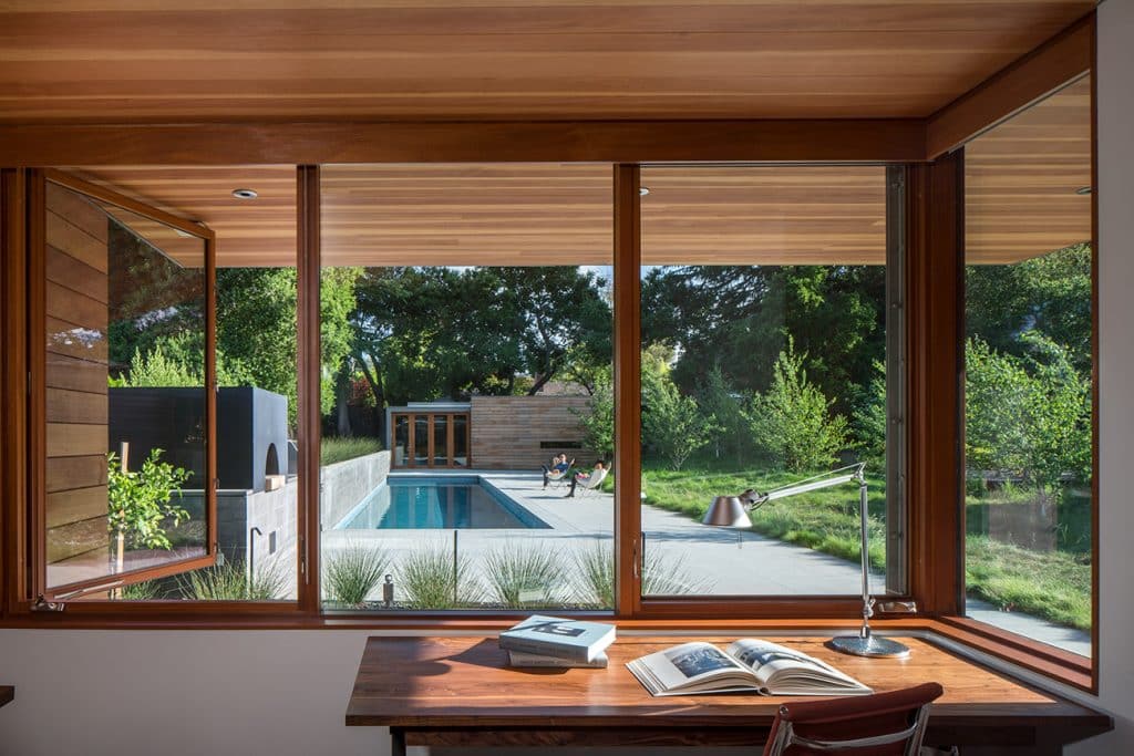 The pool and guest house of the Los Altos residence