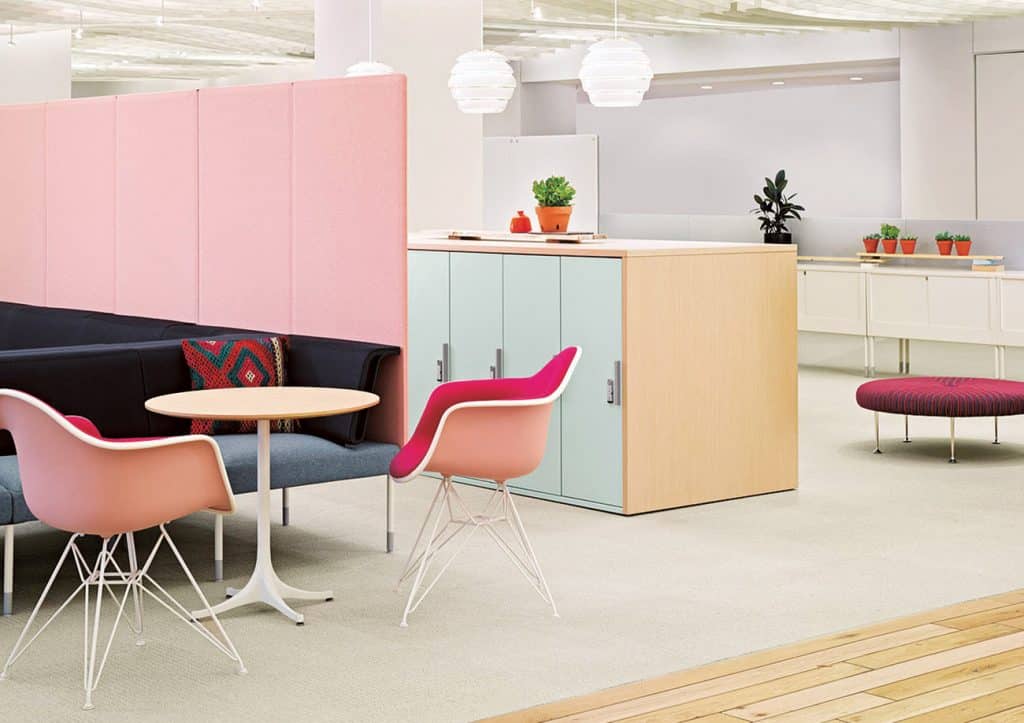 Herman Miller Furniture in an Office Setting Featuring Molded Plastic Eames Chairs and a table by Girard