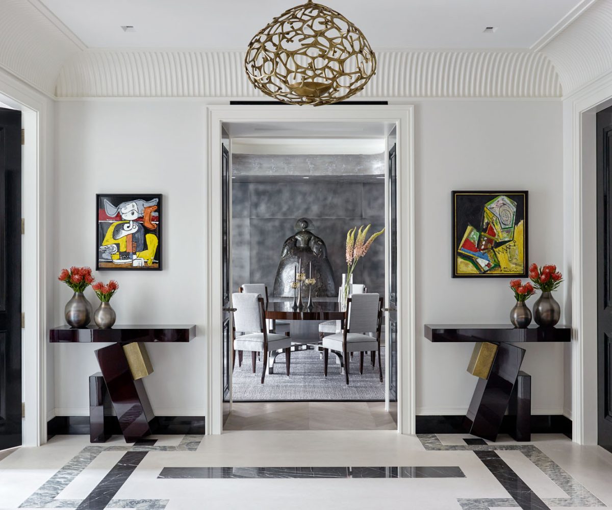 Art-filled entry gallery of Fifth Avenue Manhattan apartment designed by David Kleinberg